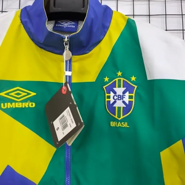 Brasil Rompevientos 2026 Azul - Brasil Barata | camisetafutbolshop